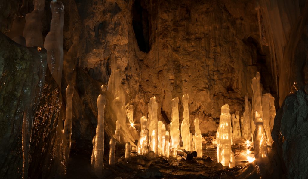 cave with crystal formation illuminated
