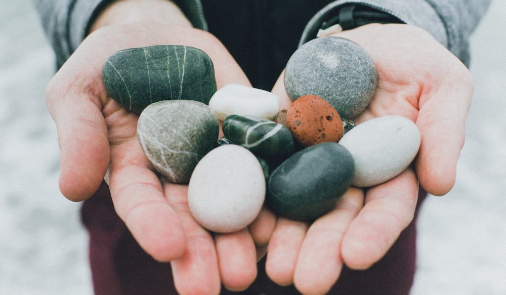 holding variety of pebbles