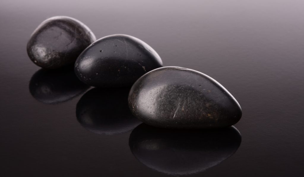 polished black pebbles