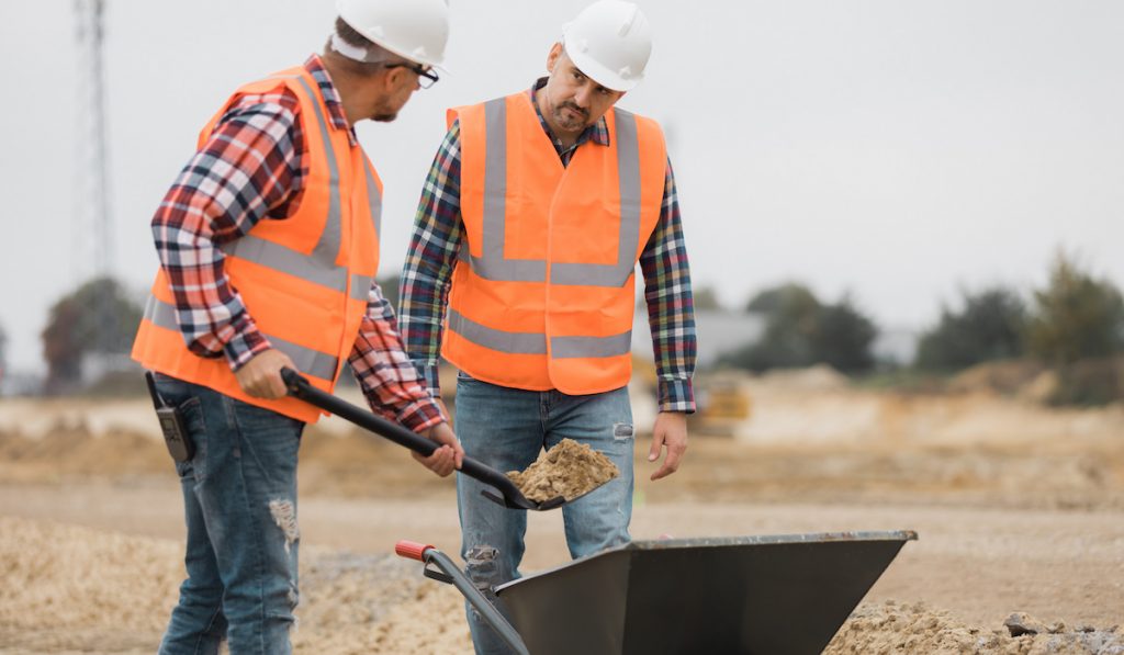 two builders wearing safety gear